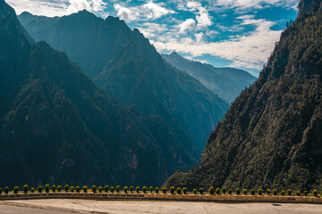 Majestic Snow-Capped Mountain Peaks under a Blue Sky at Balagezong