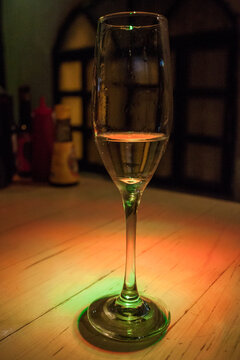 Red and Green Stylized Glass of Champagne