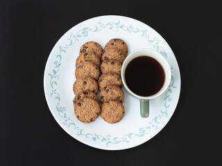 Homemade Cookies and Coffee on a white ceramic plate