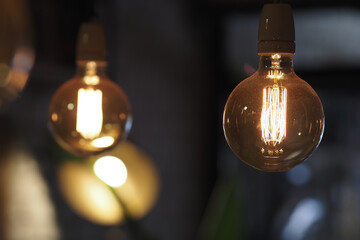 Warm glow of vintage light bulbs in a cozy setting