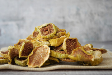 Healthy dried figs stacked on a table for snacking