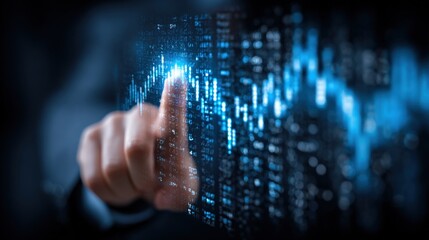Digital data technology concept with a hand pointing at glowing binary code and futuristic blue digital interface on dark background