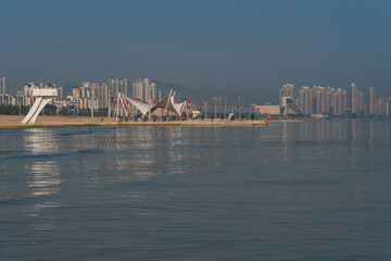 Yantai Golden Beach Coastal Park on the shore of Bohai Bay in the Yellow Sea on a sunny summer day, Yantai, Shandong, China