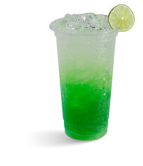 Refreshing green soda drink with lime slice
