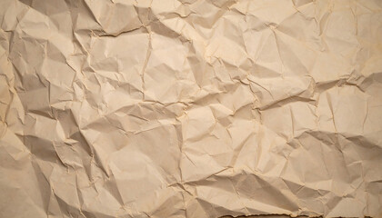 Obraz premium Crumpled textured paper surface with warm beige tone, showcasing intricate wrinkles and folds that evoke sense of age and character