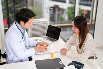 Patient attend doctor's appointment at clinic or hospital office, discussing medical treatment...