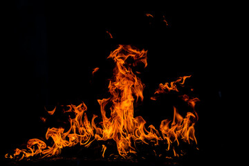 Fire blaze flames on black background. Fire burn flame isolated, abstract texture. Flaming...