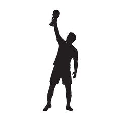 Silhouette of a soccer player lifting a trophy after winning a competition