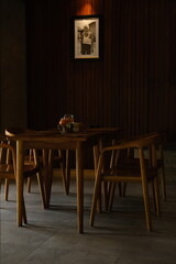 Wooden Tables and Chairs in a Small Café