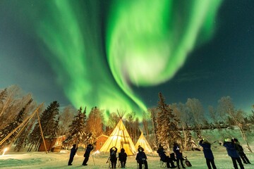 Northern Lights, Aurora Borealis over Teepee and Forest, Strong Aurora Storm, Yellowknife, Northwest Territories, Canada