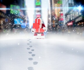 Santa delivering gifts in city