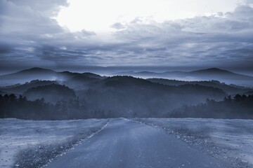 Road leading out to the horizon at night