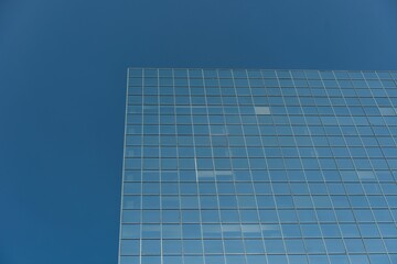 Office buildings against blue sky
