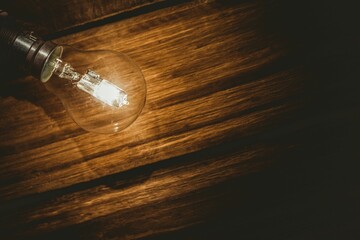 Overhead view of illuminated light bulb