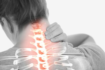 Highlighted spine of woman with back pain