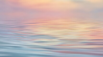Obraz premium Serene water surface reflecting soft pastel hues of a dreamy sunset sky