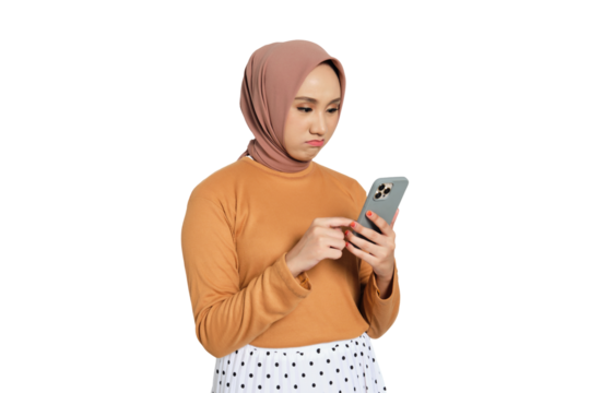 Disappointed Muslim woman in hijab frowning while reading smartphone message isolated on transparent background