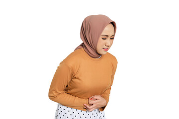 Muslim woman in hijab suffering from stomach ache and holding belly in pain isolated on transparent...