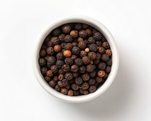 Whole black peppercorns in a white bowl isolated on white background