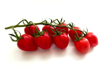 Red tomatoes on a white background