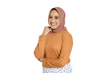 Confident Muslim woman in hijab smiling with hand on collar isolated on transparent background