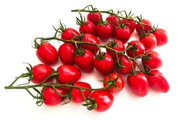 Multiple cherry tomato clusters on white background

