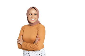 Confident woman wearing hijab crossing arms and smiling isolated on transparent background