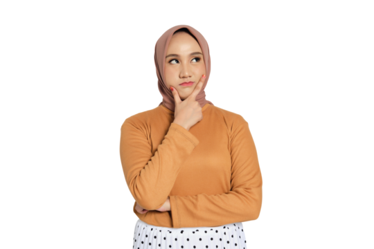 Thoughtful young Muslim woman in hijab with hand on chin looking up isolated on transparent background