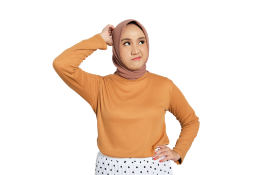 Confused young Muslim woman in hijab scratching head and looking up isolated on transparent background
