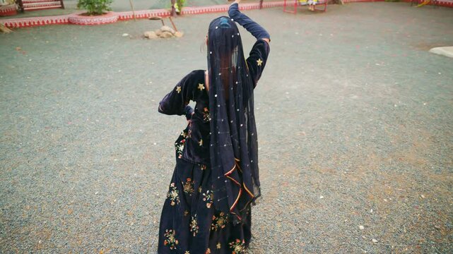 Folk artist enact regional routine at community fair