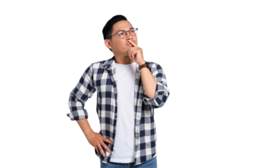 Pensive young man in glasses and checkered shirt touching lips while thinking deeply with serious expression isolated on transparent background