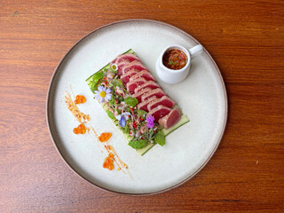 Seared Tuna Salad with Spicy sauce in Thai Northern Style. Beautiful Fusion food, Fine dining plate decorating ideas