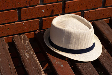 Stylish Panama Hat on a Wooden Bench