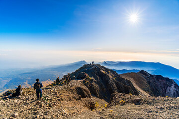 Hiker and traveller hiking at Mount Rinjani, Lombok, the second highest volcano in Indonesia.