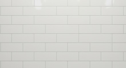 White glossy subway tiles arranged in a staggered pattern on a wall with visible light reflections