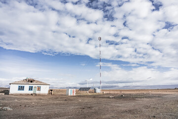 The village of Karakul high in the Pamirs in the Tien Shan mountains, a tower for providing communications
