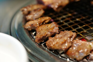 Korean BBQ with Raw Beef Short Ribs Grilled on Charcoal at Local Galbi Restaurant