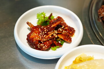 Korean BBQ with Raw Beef Short Ribs Grilled on Charcoal at Local Galbi Restaurant