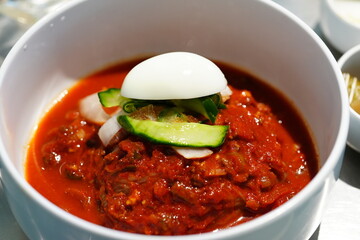 Korean BBQ with Raw Beef Short Ribs Grilled on Charcoal at Local Galbi Restaurant