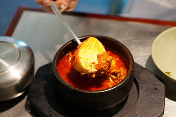 Korean BBQ with Raw Beef Short Ribs Grilled on Charcoal at Local Galbi Restaurant