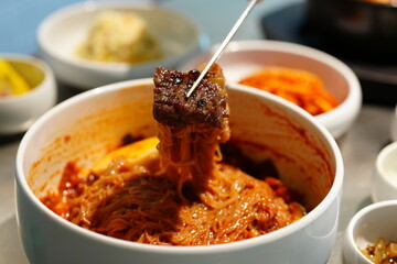 Korean BBQ with Raw Beef Short Ribs Grilled on Charcoal at Local Galbi Restaurant