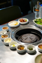 Korean BBQ with Raw Beef Short Ribs Grilled on Charcoal at Local Galbi Restaurant
