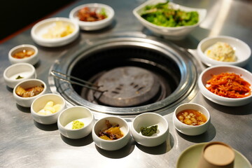 Korean BBQ with Raw Beef Short Ribs Grilled on Charcoal at Local Galbi Restaurant