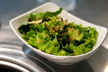 Korean BBQ with Raw Beef Short Ribs Grilled on Charcoal at Local Galbi Restaurant