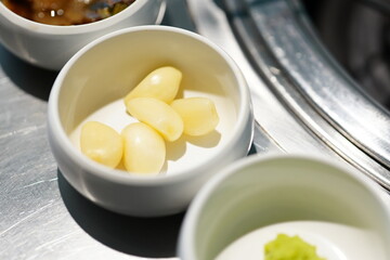 Korean BBQ with Raw Beef Short Ribs Grilled on Charcoal at Local Galbi Restaurant