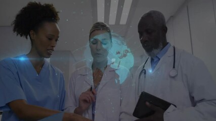 Nurse pointing at chart in hallway and activating holographic globe for medical team consensus - Powered by Adobe