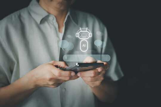 A person holds a smartphone with an AI chatbot interface overlay, symbolizing the integration of artificial intelligence into daily life and mobile technology. Concept of digital communication.