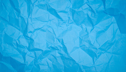 Obraz premium Crumpled blue paper texture background 