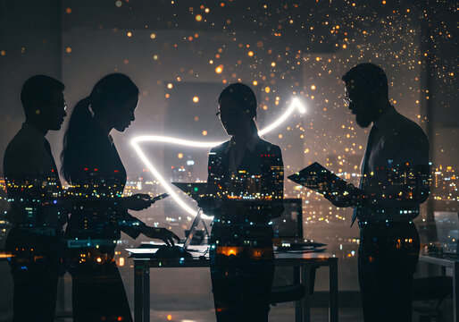 Silhouetted business team collaborating, illuminated by data visualization, overlooking city lights.