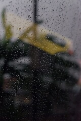 detail of raindrops on car window